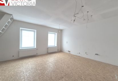 Dwupoziomowe mieszkanie do wykończenia.