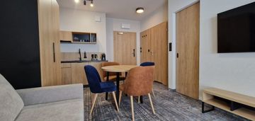 Apartament z miejscem w garażu i balkonem