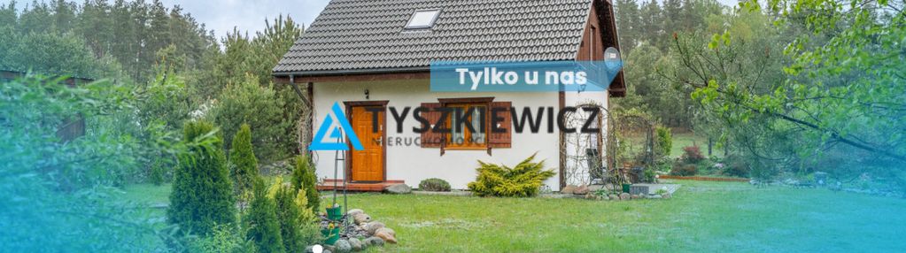 Urokliwy dom, otoczony drzewami, nad j.kamieniczno