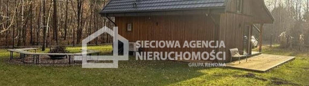 Dom drewniany nad morzem