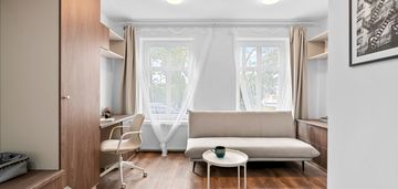 **dwa pokoje po remoncie w pięknej kamienicy**