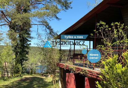 Domek w gołubiu z widokiem na jezioro dąbrowskie
