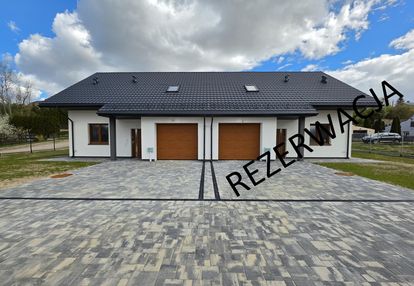 Nowy dom w zabudowie bliźniaczej z garażem i widokiem na łomżę i narew