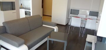Apartament - salon z aneksem sypialnym, kuchnia