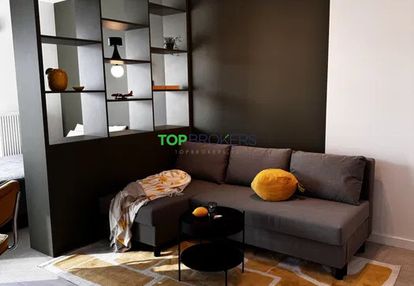 Nowoczesny salon z aneksem i sypialnia, garaż