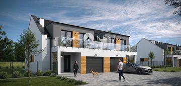 Nowoczesny dom z garażem w zabudowie bliźniaczej