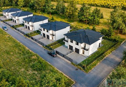Nowoczesny dom z garażem w nowych iganiach | 162,6