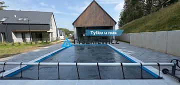 Nowoczesny dom lakeside w standardzie premium.