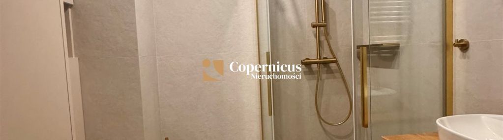 Nowocześnie wykończony apartament z ogródkiem
