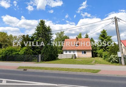 Działka 1564 m² z budynkiem bliźniaczym przy dk12
