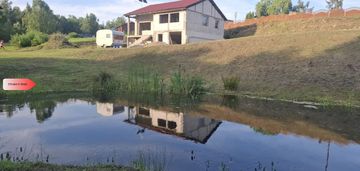 Dom w budowie nad rzeką dz. 2924 m²  natura 2000