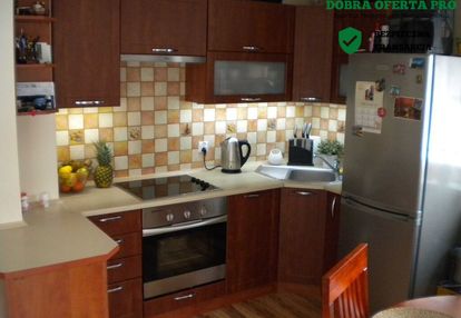 2-pokojowe mieszkanie z halą garażową i komórką