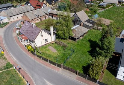 Dom z zabudowaniami gospodarczymi, duża działka