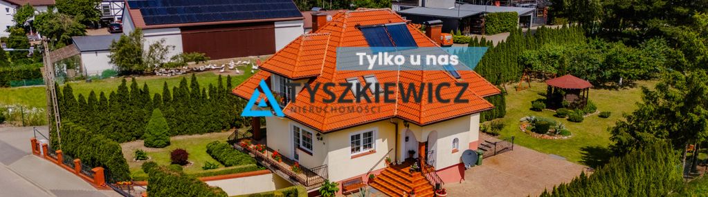 Atrakcyjny dom z pięknie zagospodarowanym ogrodem