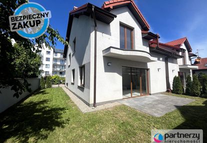 Gotowy do wprowadzenia garaż ogród