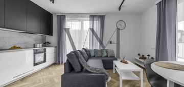 Julianów,pierwszy najemca, kawalerka, balkon,garaż