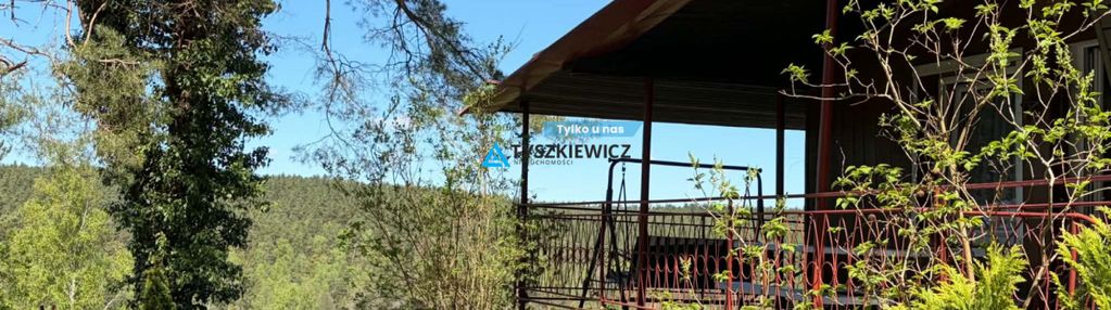 Domek w gołubiu z widokiem na jezioro dąbrowskie
