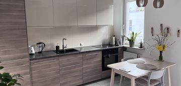 nowoczesna kawalerka Garaż + Garderoba