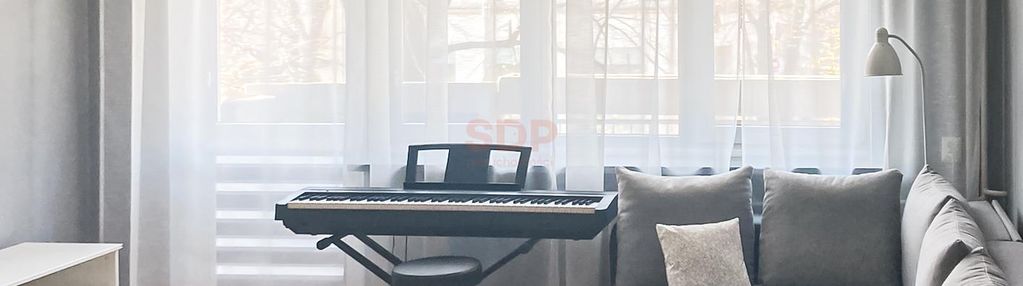 2-pokojowe mieszkanie z balkonem w centrum.