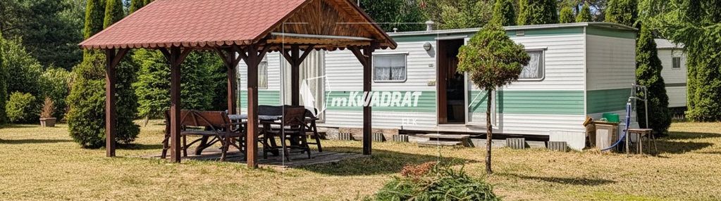 Działka z domkiem holenderskim.