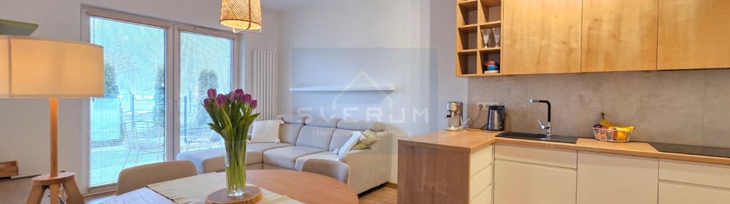 Mieszkanie z ogródkiem, parkitka