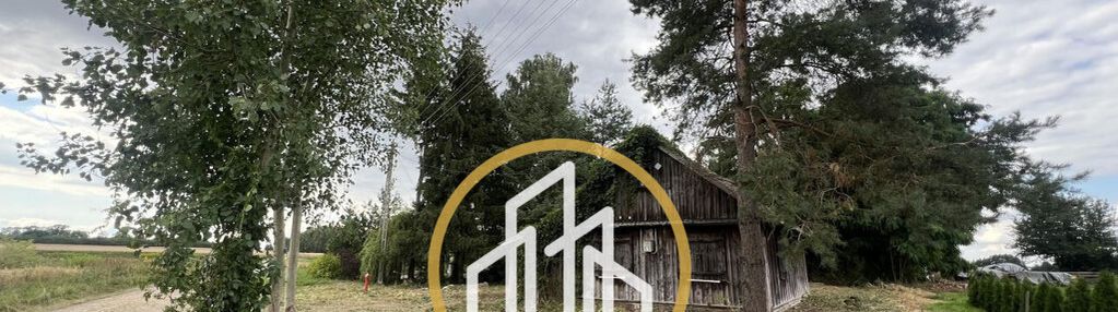 Działka z domem drewnianym