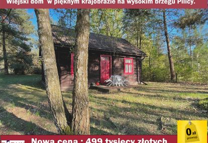 Do sprzedania drewniany dom nad rzeką pilicą.