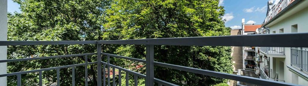 Extra urządzone mieszkanie balkon zieleń centrum