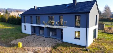 Nowoczesny dom w zabudowie bliźniaczej - rogoźnik