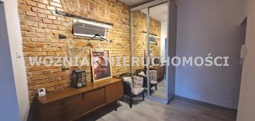 Eleganckie mieszkanie z balkonem w centrum