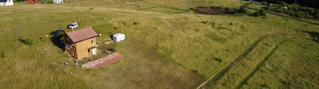 Przepięknie położona działka z domkiem całorocznym