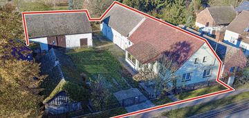 Dom z warsztatem, stodołą i oborą