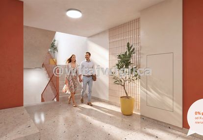 Butikowy apartamentowiec, boczna uliczka