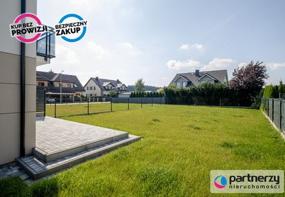 Nowy dom z garażem - słoneczny ogród