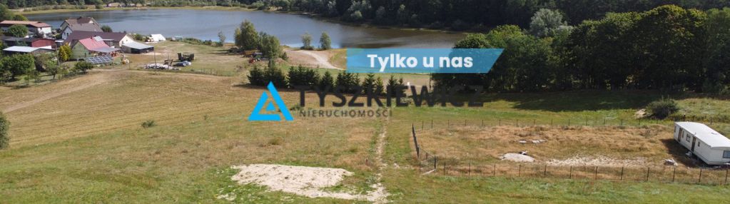 Działka nad jeziorem w okuninie