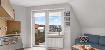 Dupoziomowy apartament z dwoma balkonami