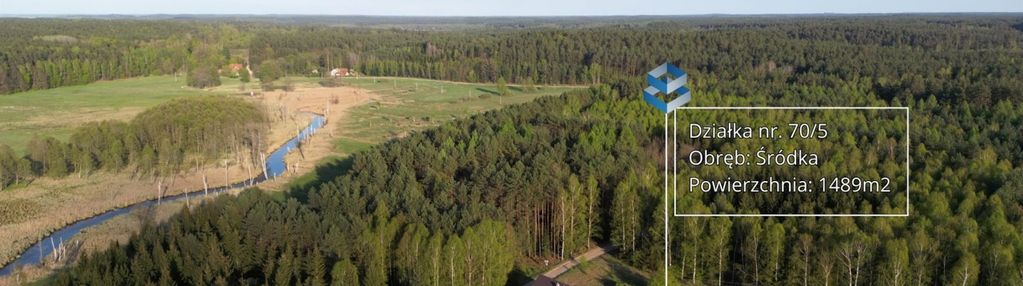 Działka otoczona lasami - śródka