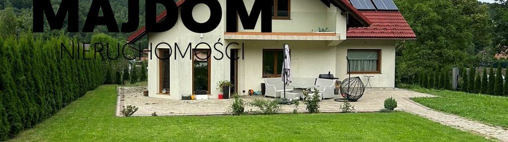 Dom w bajkowej scenerii
