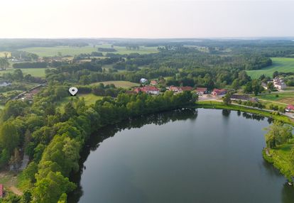 Urokliwa działka nad strumykiem, blisko jeziora.