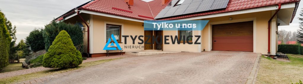 Dom blisko jeziora z fotowoltaiką i pompą ciepła