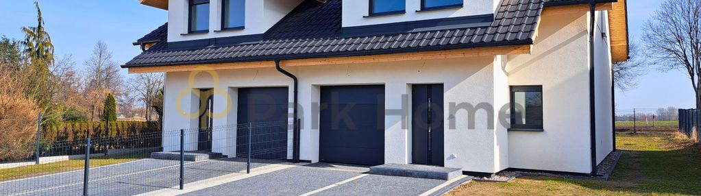 Dom w zabudowie bliźniaczej z garażem