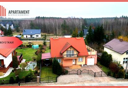 Dom w kolinczu z dwoma garażami i działką 900 m² –