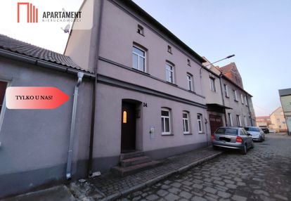Dom z podwórkiem i garażem w centrum nml