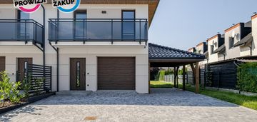 Nowy dom z garażem - słoneczny ogród