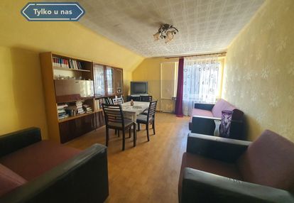 Mieszkanie w budynku z dużą działką.