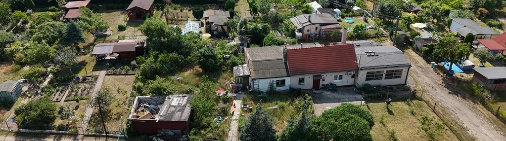 Nieruchomość z 2 garażami -5,72ar