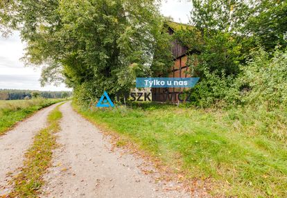 Działka siedliskowa 3 239 m² z zabudowaniami