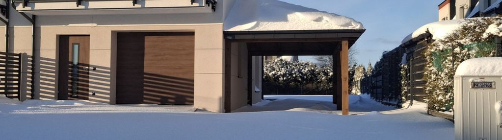 Nowy dom z garażem - słoneczny ogród