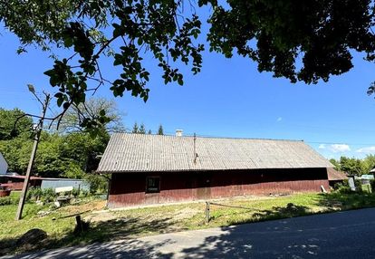 Drewniany dom na 13 ar działce- chorkówka.