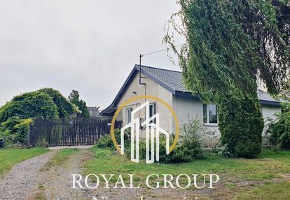 Na sprzedaż 64 arowa działka z domem.